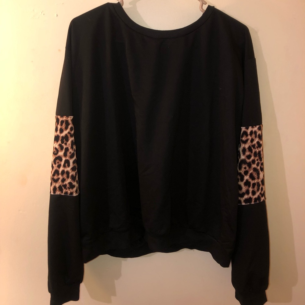 Adorable leopard accented sweatshirt